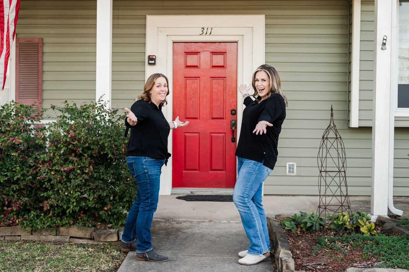 The front porch and red door of the Texas Christian Wellness office in Wylie, Texas